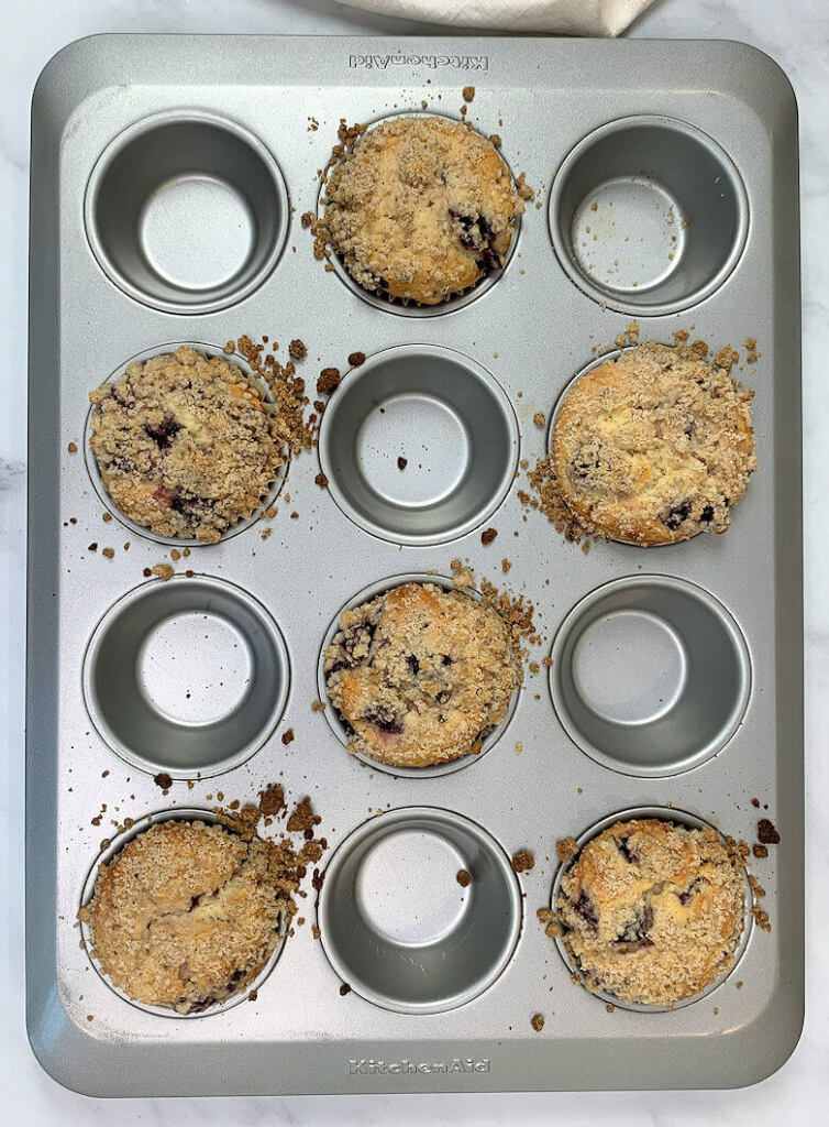 baked cherry muffins in muffin pan